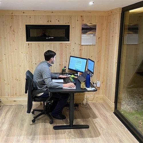 Tadesperson in the Garden Office